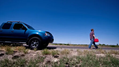 Salt Lake City Utah man walking with gas can Man walking with gas can. With Us you'll never have to worry about this situation.